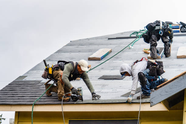 Professional Roofing technician working in Talent, OR
